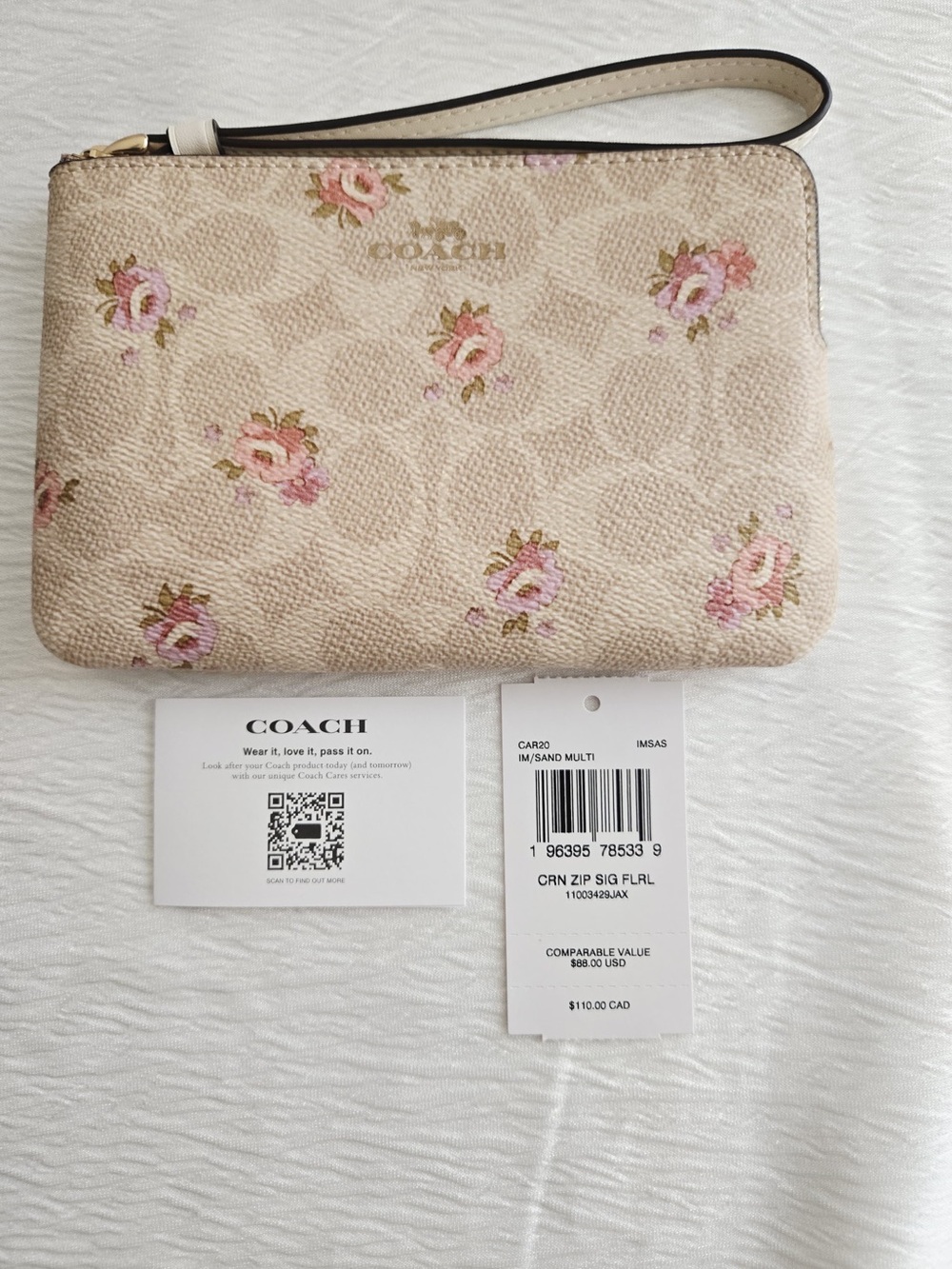 Coach Corner Zip Wristlet in Signature Canvas with Stripe Froral